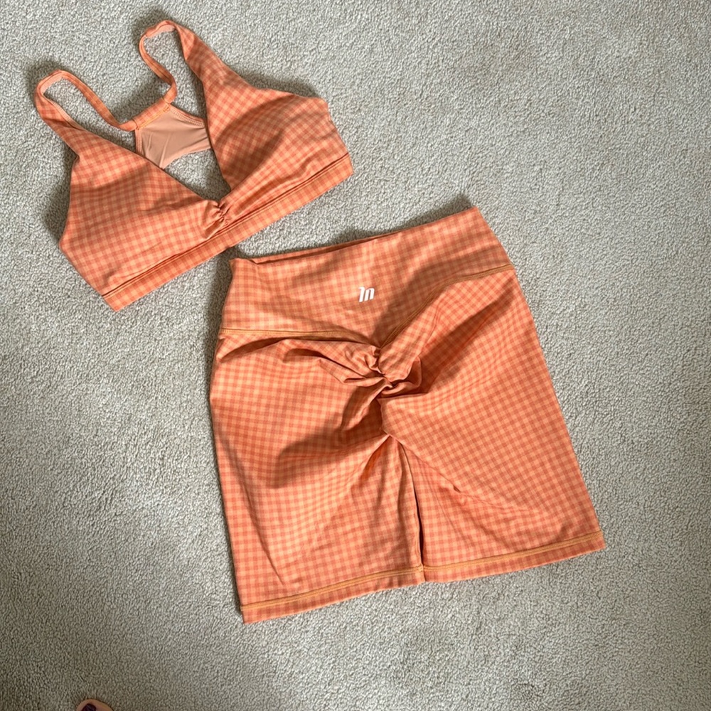 Set of NEW orange gingham MuscleNation scrunch back shorts & matching bra.